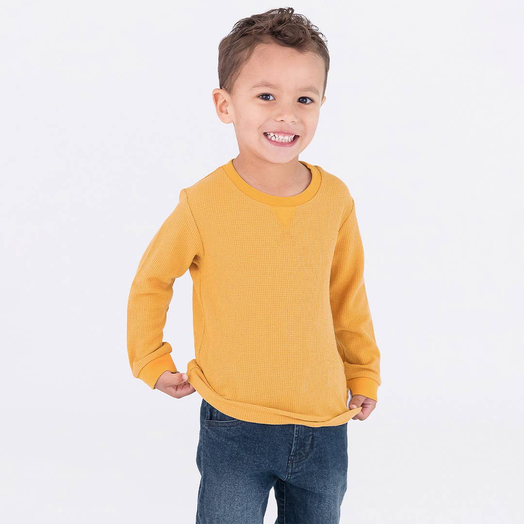 boy with mustard waffle long sleeve shirt
